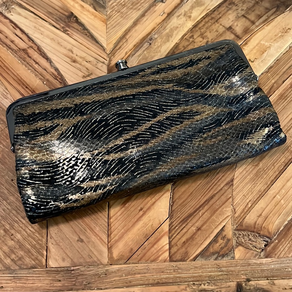 Hobo International Lauren clutch/wallet. Boho animal print w metallic gold.